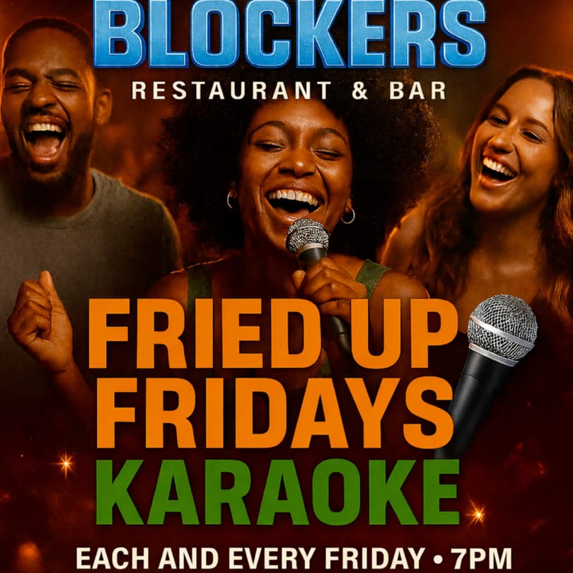 Three people laughing and singing karaoke at Blockers Soul Food Restaurant & Sports Bar.